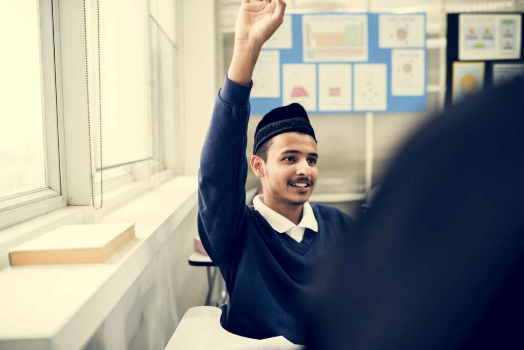 Young muslim student in class in uae school
